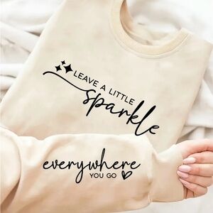 Cream Graphic Sweatshirt “✨LEAVE A LITTLE SPARKLE - EVERYWHERE YOU GO 💜”